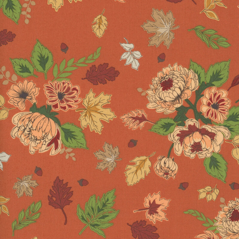 Rust colored fabric with a blush and green, mustard, and rose foliage.