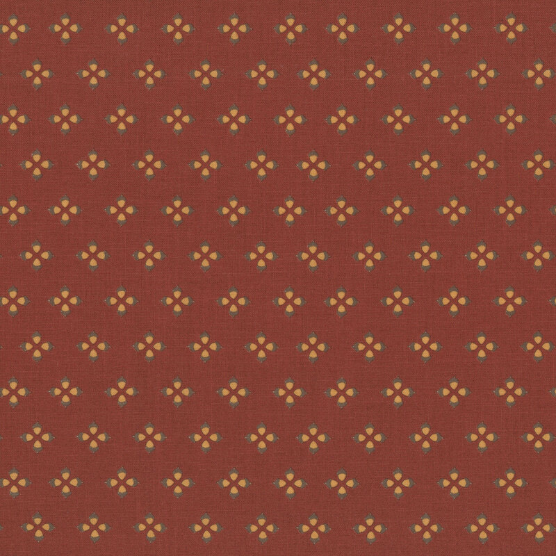 A mahogany red fabric swatch featuring a geometric acorn pattern.