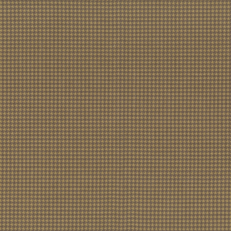 A houndstooth fabric swatch in tonal brown hues.