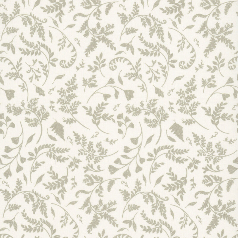 A beige fabric featuring a tossed vine and leaf print.