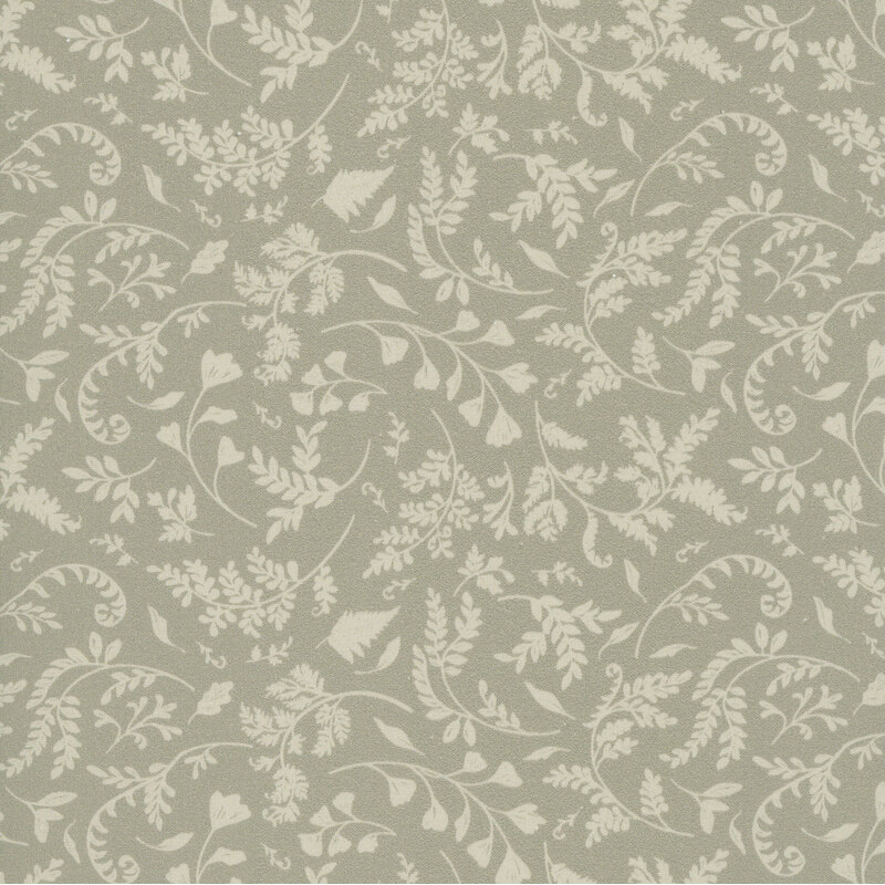 A dusty khaki fabric featuring a tossed vine and leaf print.