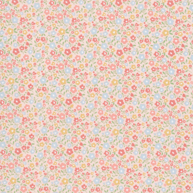 Pastel pink fabric with a calico pattern of pastel coral, peach, blue and yellow flowers.