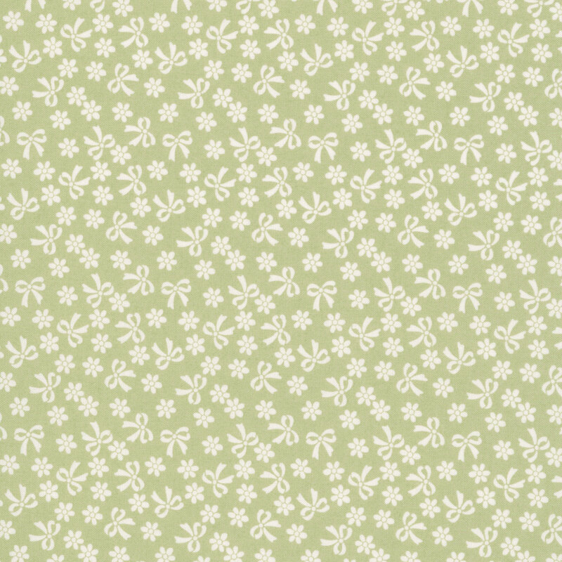 Spring green fabric with cream bows and flowers.