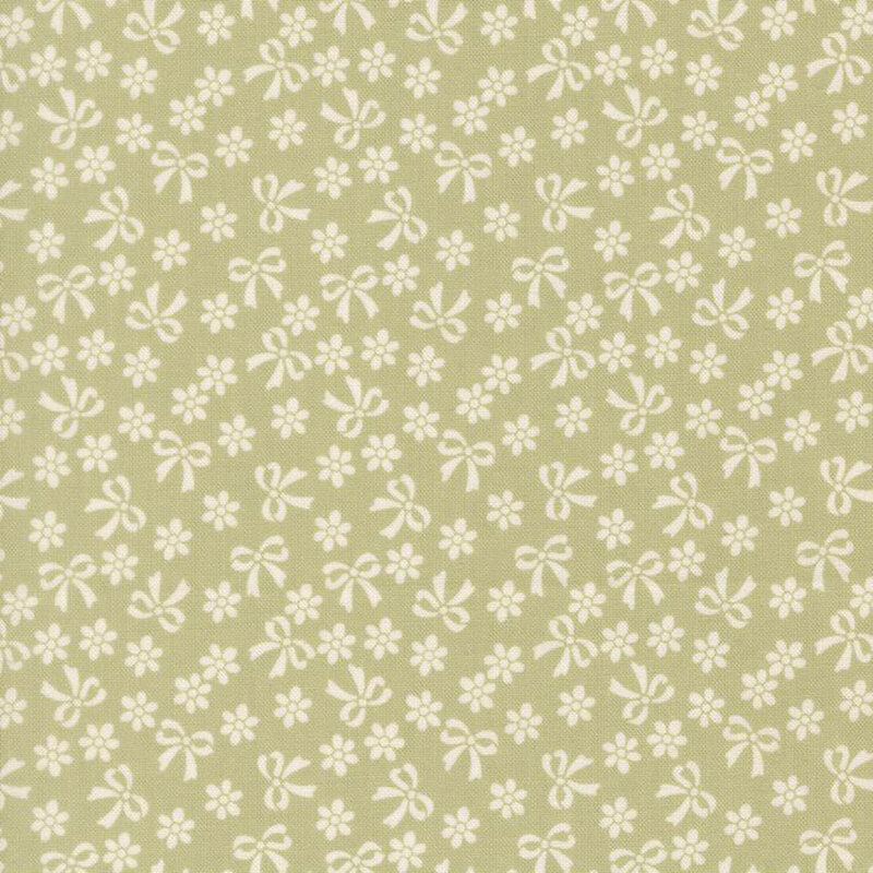 Spring green fabric with cream bows and flowers.