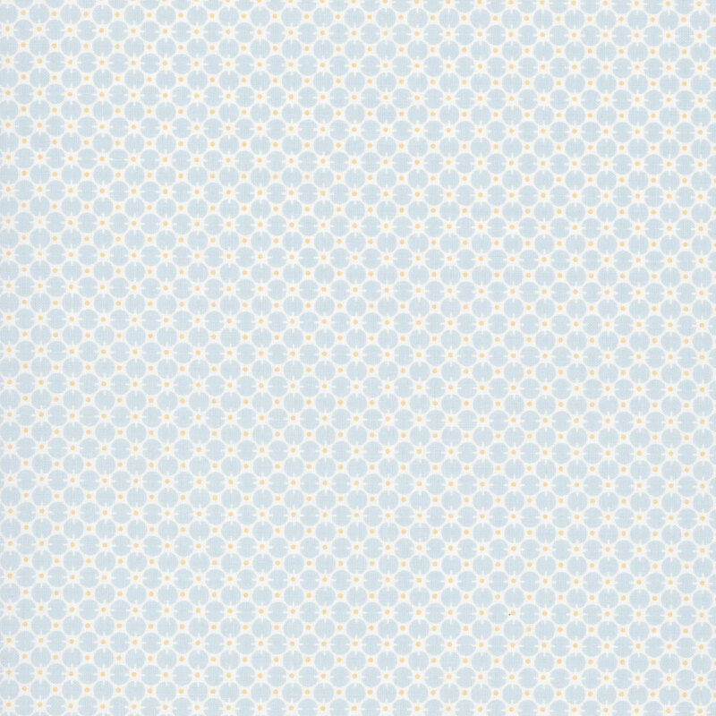 Baby blue fabric with a cream pattern of circles and gold dots