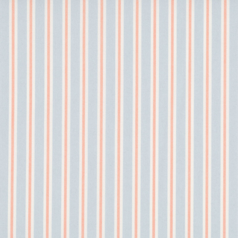 Faded blue fabric with cream and peach stripes