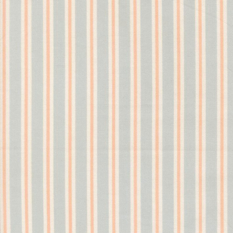 Faded blue fabric with cream and peach stripes