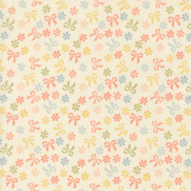 Cream Quilting Cuddle fabric with a calico pattern of pastel coral, peach, blue and yellow flowers.