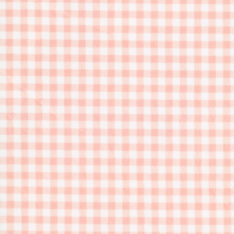 Peach and white gingham Quilting Cuddle fabric.