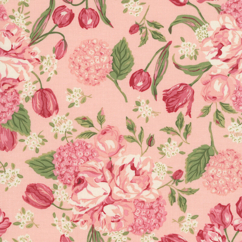 Rose pink fabric with a scattered pattern of large, pink and cream florals including hydrangeas, tulips, and roses