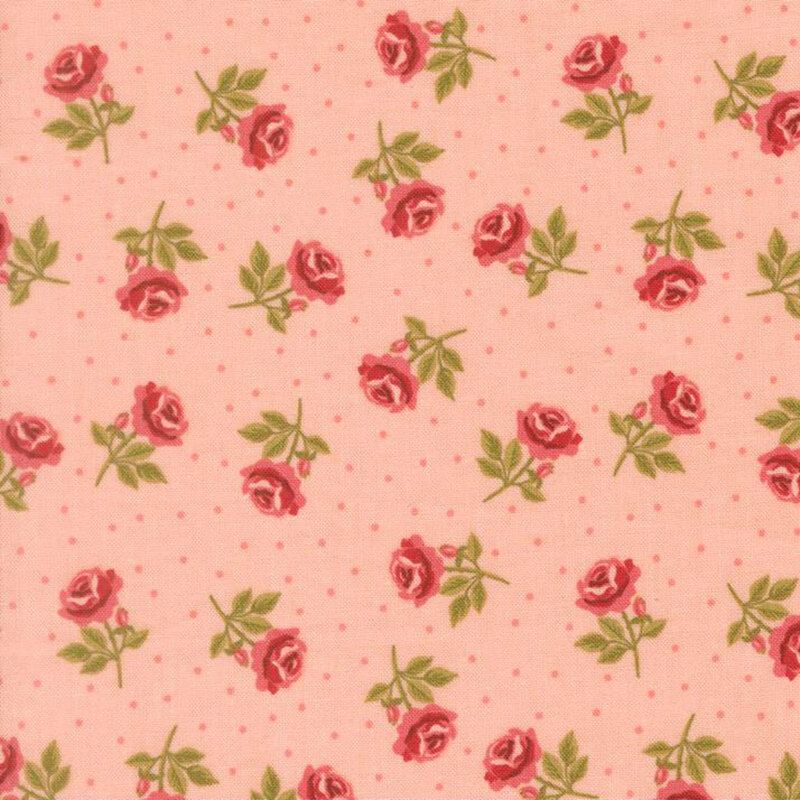 Coral pink fabric with pink polka dots and tossed dark pink, stemmed roses