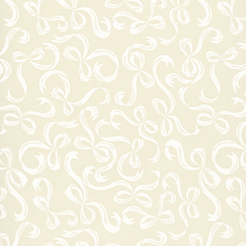 Beige fabric with a pattern of swirling cream bows