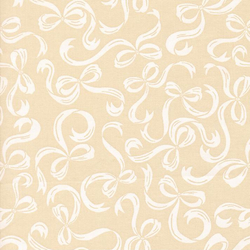 Beige fabric with a pattern of swirling cream bows