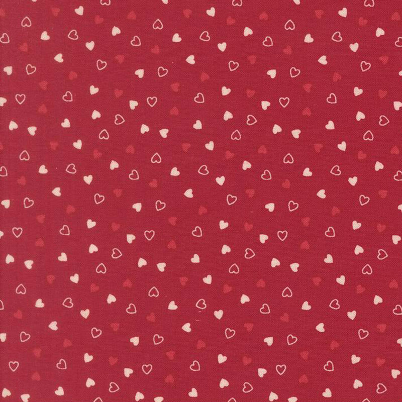 Tossed red and cream hearts on a burgundy red background