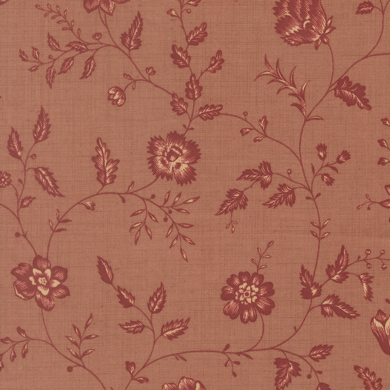 A clay fabric featuring a dark red and cream floral and vine print.