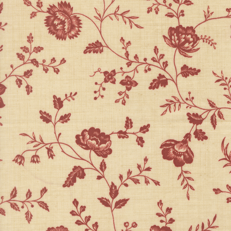 A cream fabric featuring a red floral and vine print.
