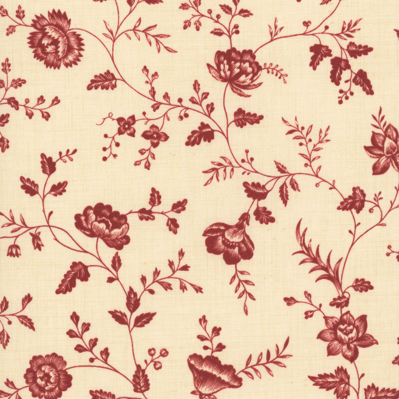 A cream fabric featuring a red floral and vine print.