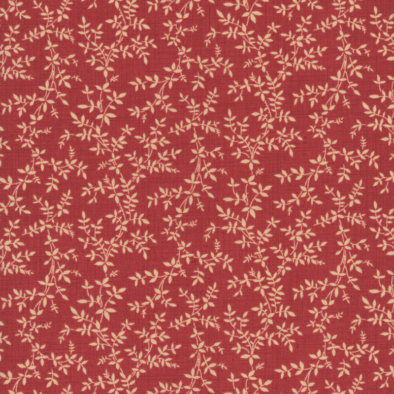 A rouge fabric featuring a beige vine print.