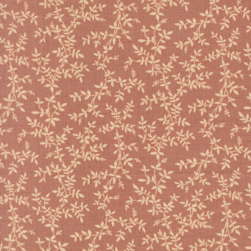 A dark blush fabric featuring a cream vine print.