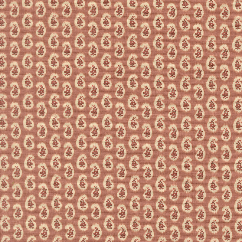 Dark blush fabric featuring a repeating teardrop pattern filled with delicate florals.