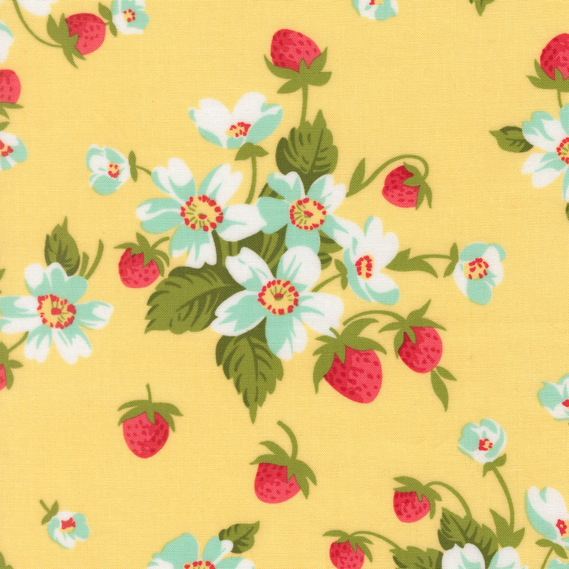 A yellow fabric with bunches of strawberry plants with white flowers. 