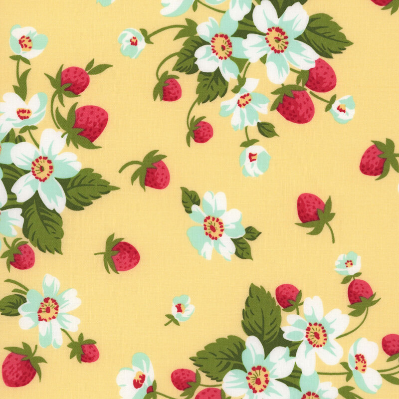 A yellow fabric with bunches of strawberry plants with white flowers. 