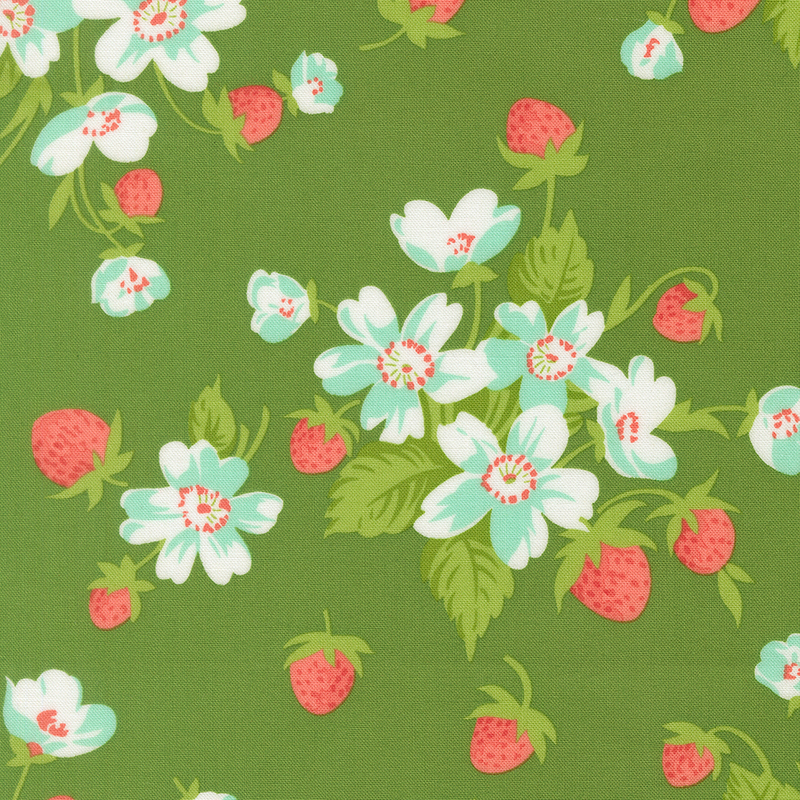 A green fabric with bunches of strawberry plants with blue flowers. 