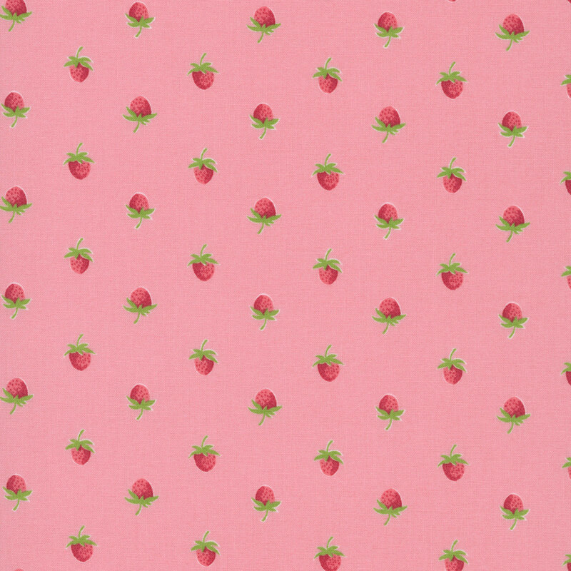 A coral pink fabric with a half drop pattern of red strawberries. 