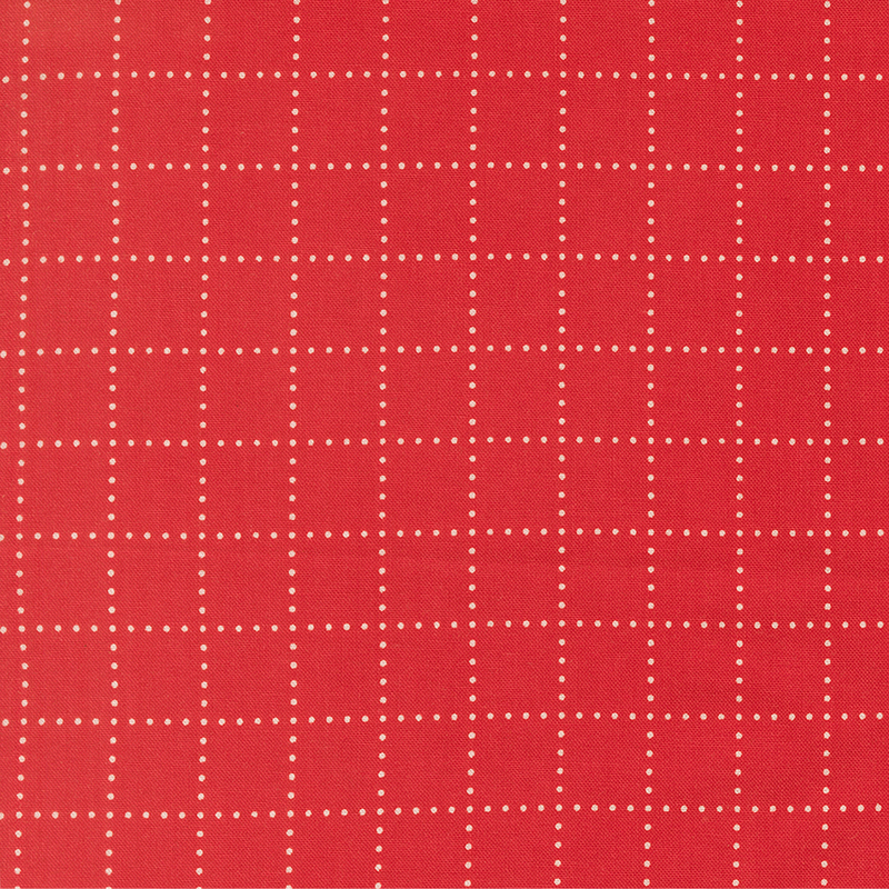 A ruby red fabric with white dots forming a grid. 