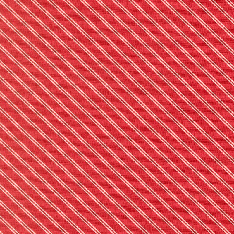 A ruby red fabric with white stripes. 