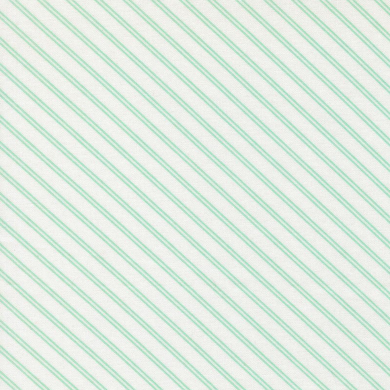 A white fabric with aqua stripes. 