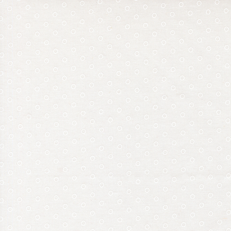 A white on white fabric with polka dots in a half drop pattern. 