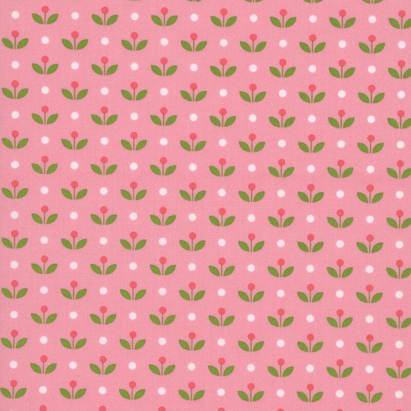 A coral pink fabric with vintage inspired flowers with white polka dots. 