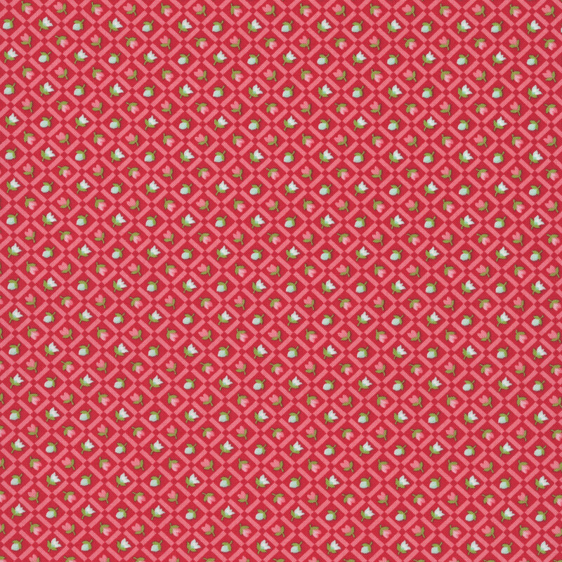 A ruby red fabric with aqua and pink rosettes framed by a watermelon red lattice. 