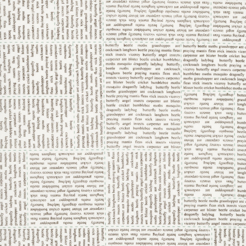 An off white fabric swatch featuring a news style text print in brown.