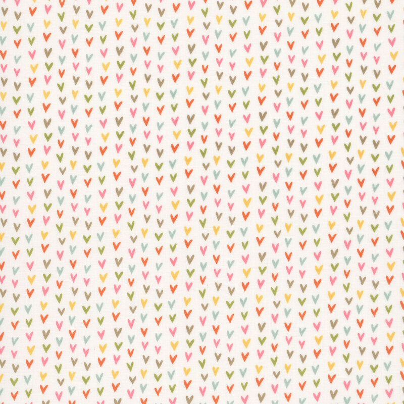 A cloud fabric swatch featuring rows of multicolored hearts.