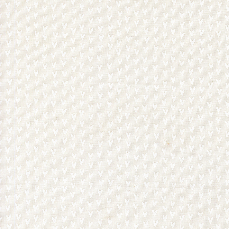 A cloud fabric swatch featuring rows of white hearts.