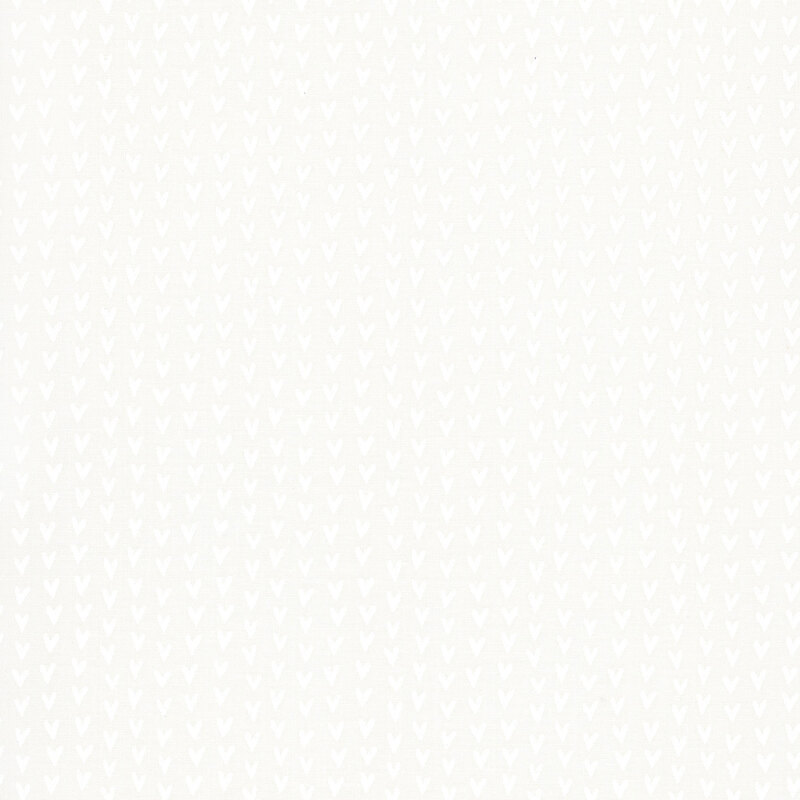 A cloud fabric swatch featuring rows of white hearts.