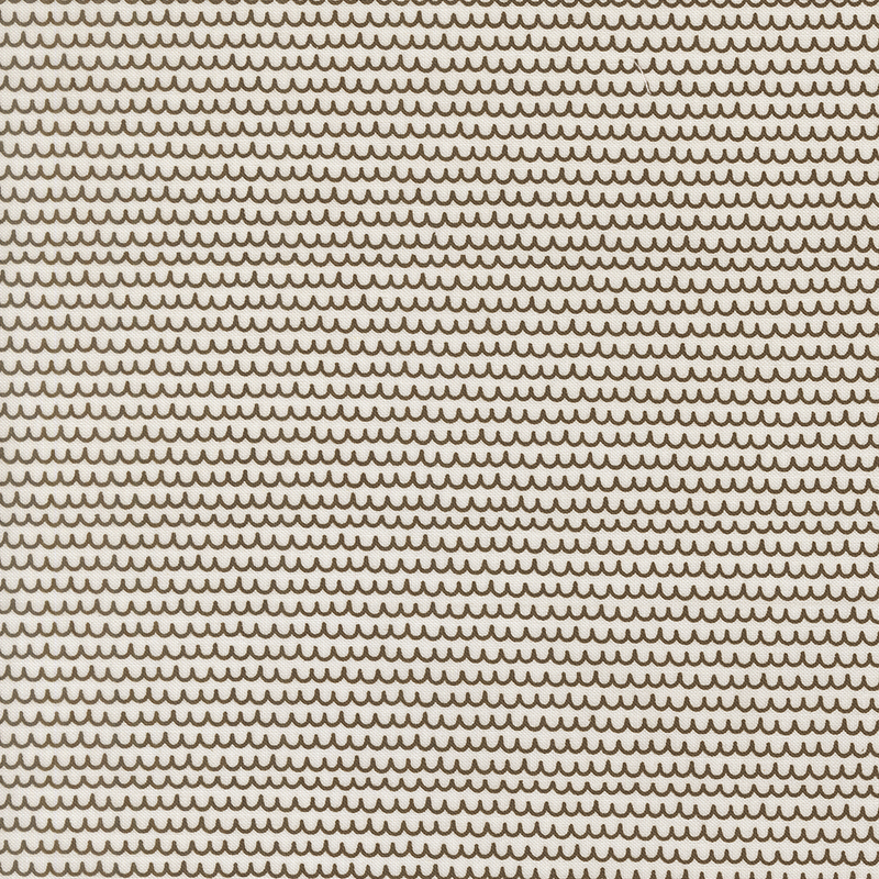 A light palomino fabric swatch featuring brown scalloped lines.