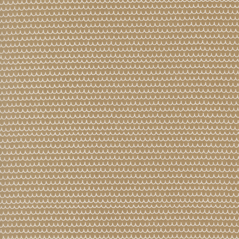 A tan fabric swatch featuring brown scalloped lines.