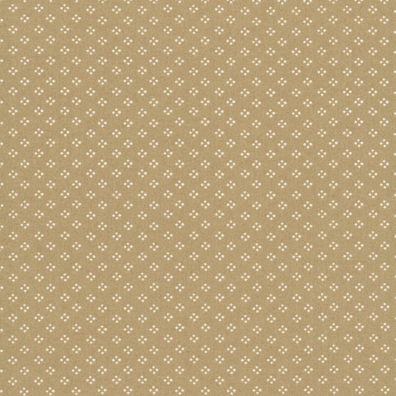 A tan fabric featuring a dotted geometric pattern in white.