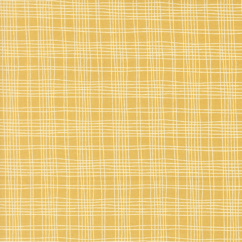 A ocher fabric swatch featuring a free handed plaid pattern in white.
