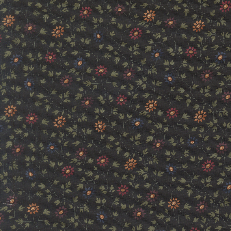Soft black fabric swatch featuring green vines and flowers in shades of yellow, blue, red, and purple.