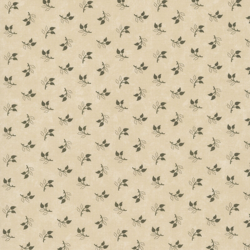 Mottled sand fabric featuring a tossed pattern of sprig leaves.