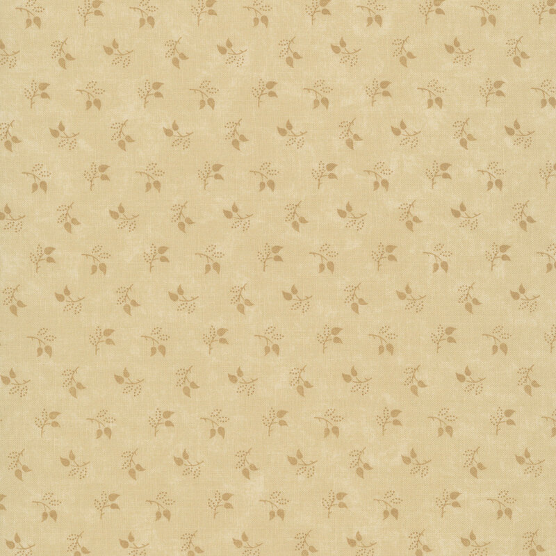 Mottled sand fabric featuring a tossed pattern of sprig leaves.