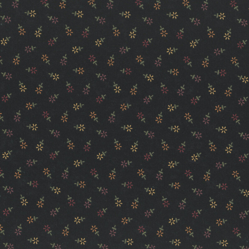 Mottled black fabric featuring a tossed geometric floral print in hues of red, yellow, and purple.