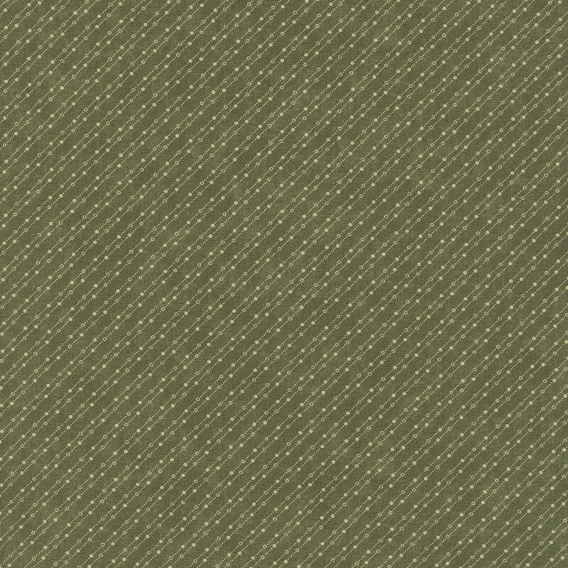 Dark sage mottled fabric featuring a stylized beaded-chain pattern in soft cream.