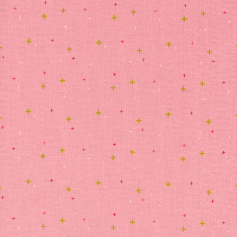 gold crosses scattered with raspberry crosses on rose pink fabric