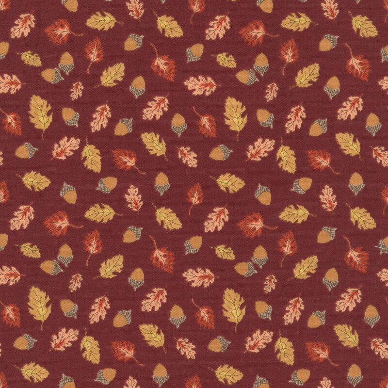 A brown rust fabric swatch featuring a pattern of tossed acorns and leaves.