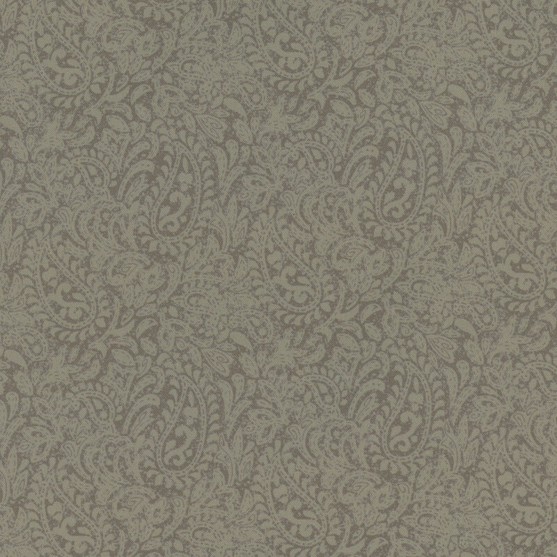 Muted brown fabric with a tonal paisley design
